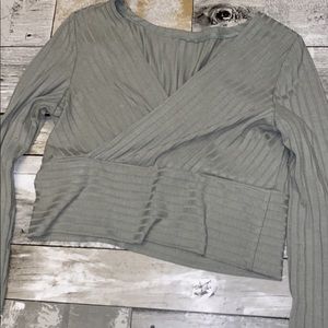 Light sage green shirt. looks different in picture , it is a little more green.